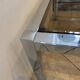 Square coffee table with smoked glass top and chrome base an70