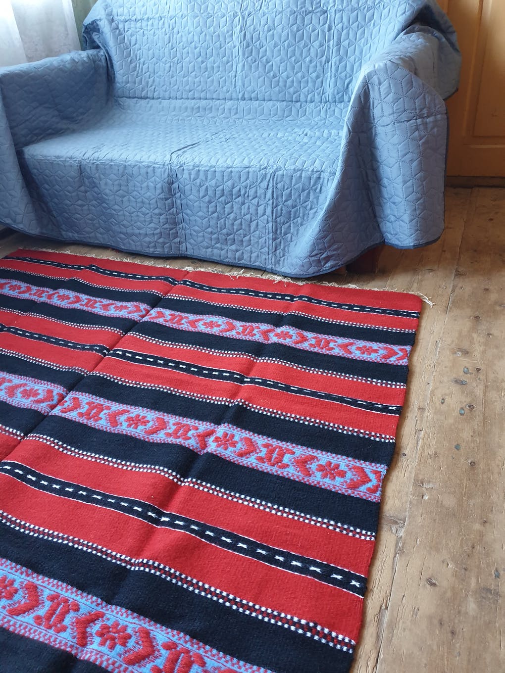 Traditional rustic red wool rug with stylized design and stripes, authentic hand-woven 160x230cm
