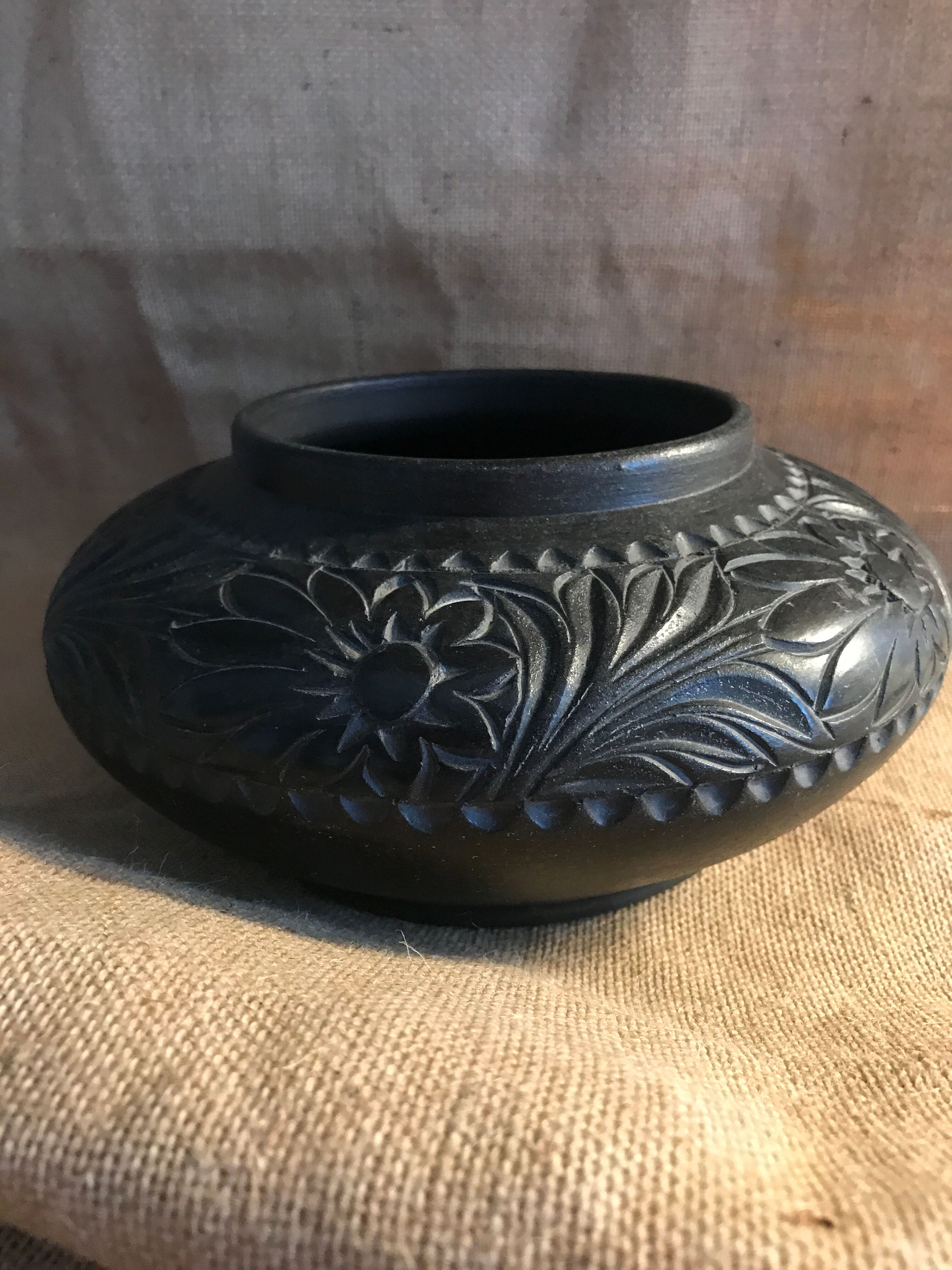 Engraved terracotta vase