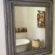 Antique patinated wood mirror
