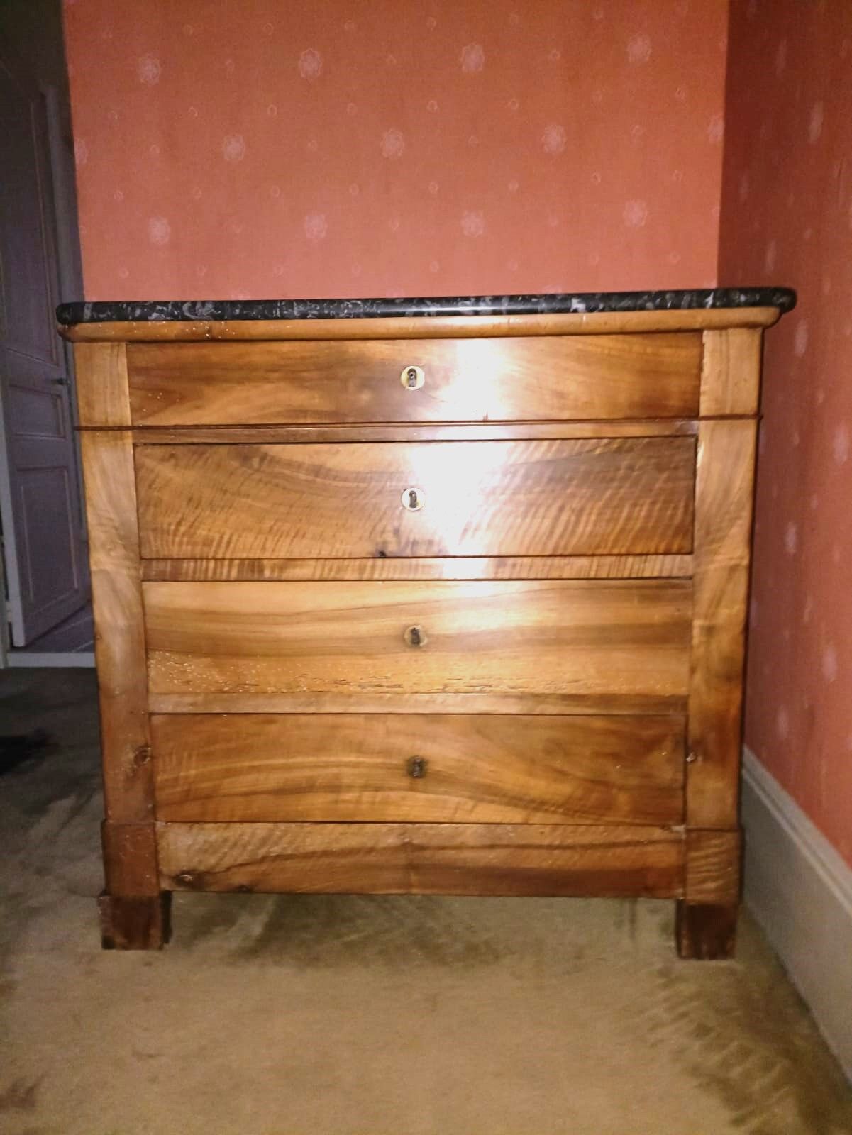 Wooden chest of drawers with marble top