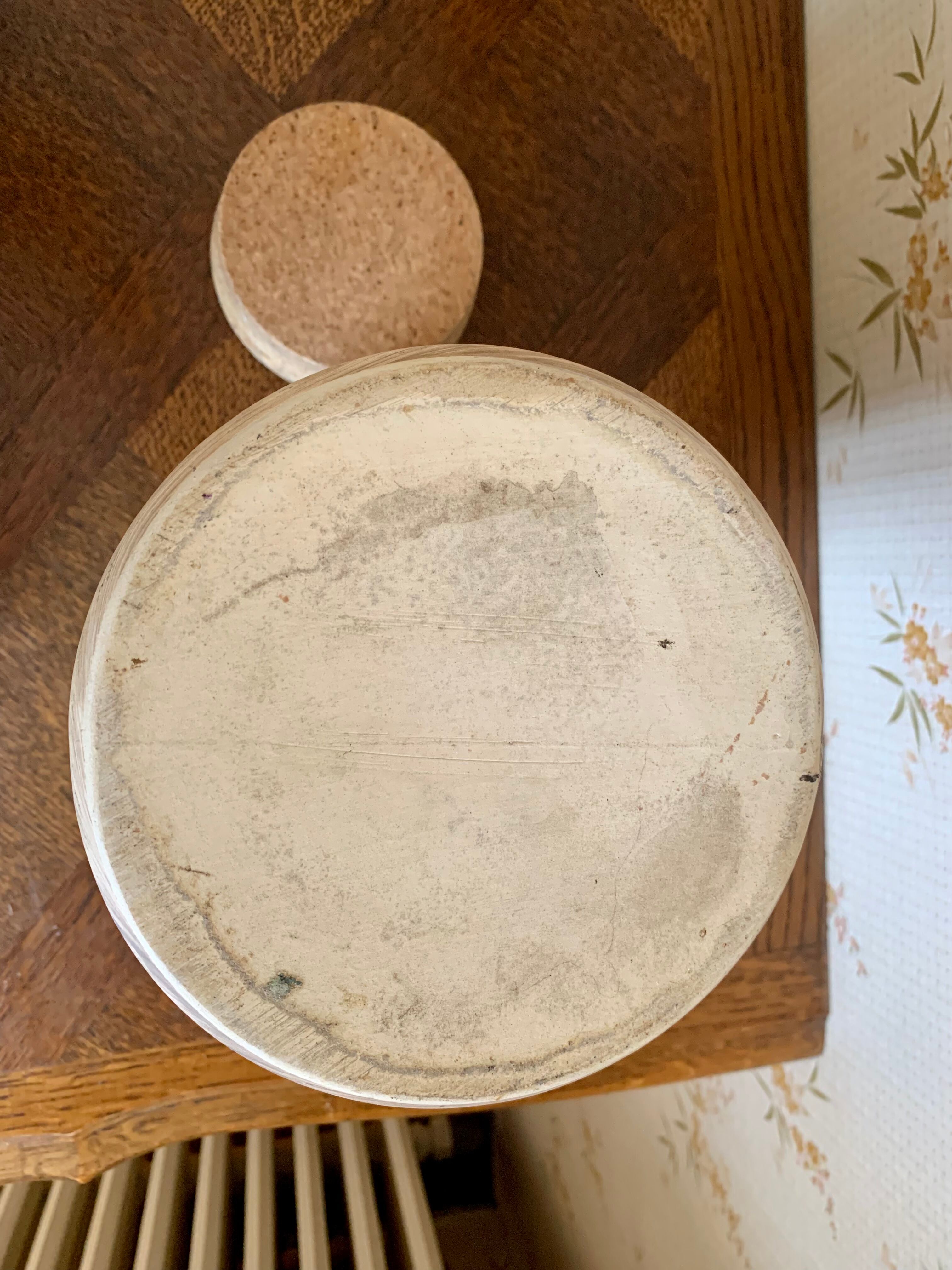 Old sandstone pot with cork lid