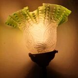 Antique brass wall light with art deco molded glass