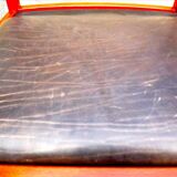 Four Scandinavian-style chairs