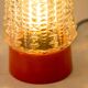Built-in glass dome and vintage round orange base from the 70s