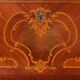 Antique drop-leaf table in walnut with maple inlays, Italy, 20th century.