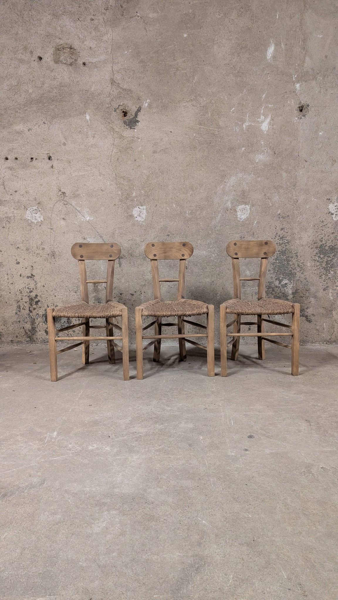Set of 3 rustic wooden and woven straw chairs