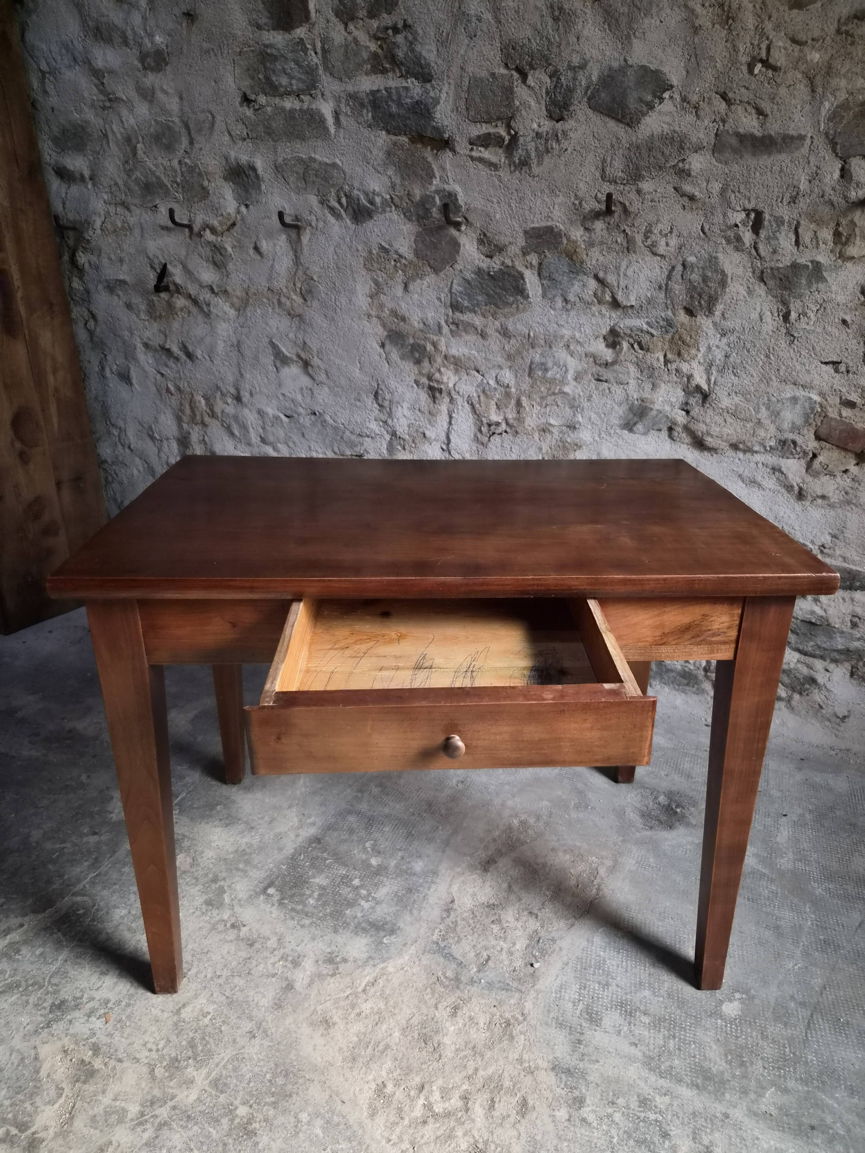Old French table in cherry wood with bistro chair, circa 1900–1930.