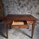 Old French table in cherry wood with bistro chair, circa 1900–1930.