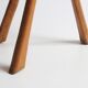 Brutalist tripod stool in carved wood, 1950s