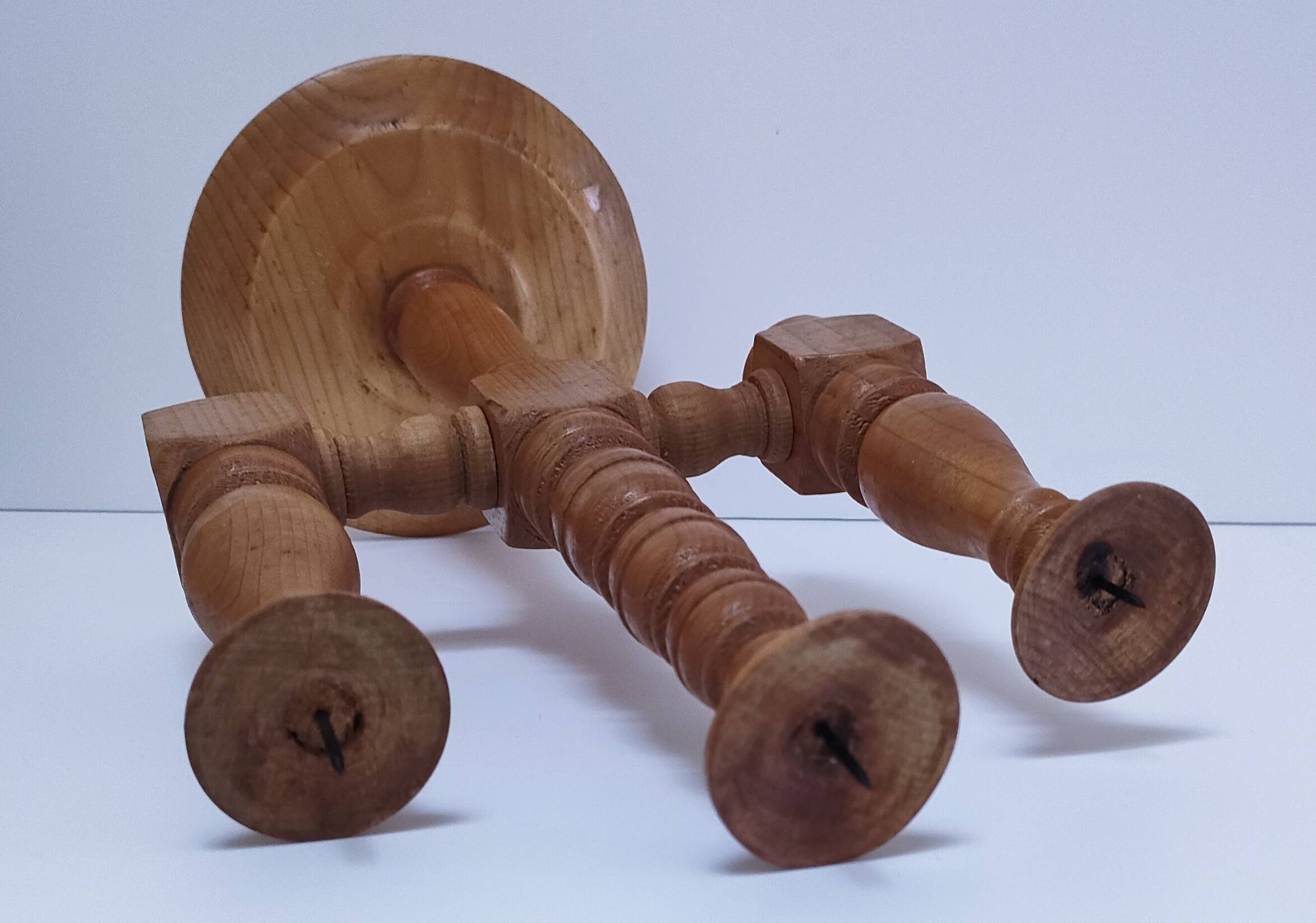 Three Scandinavian wooden candle holders, vintage design