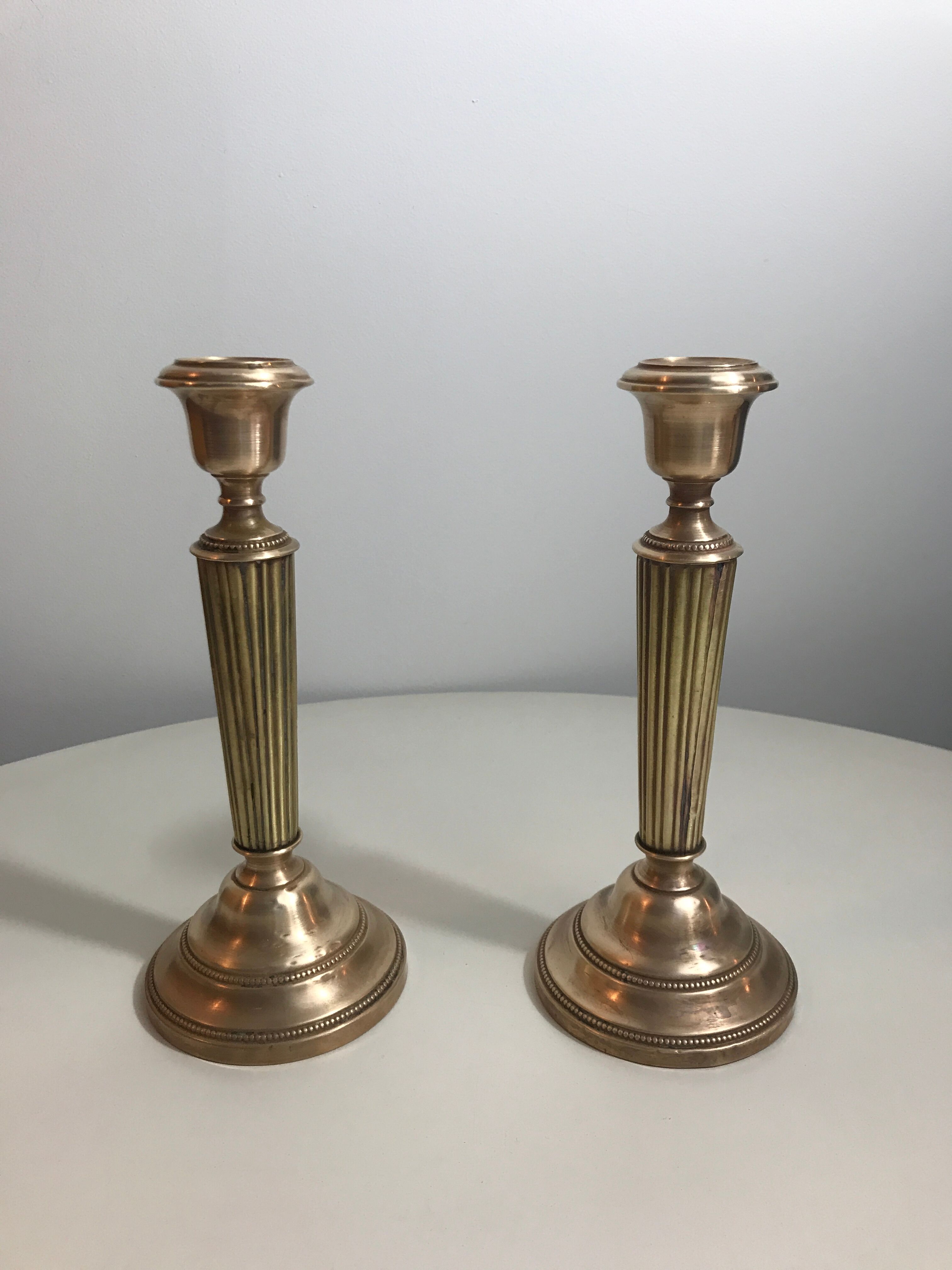 Pair of old brass candlesticks