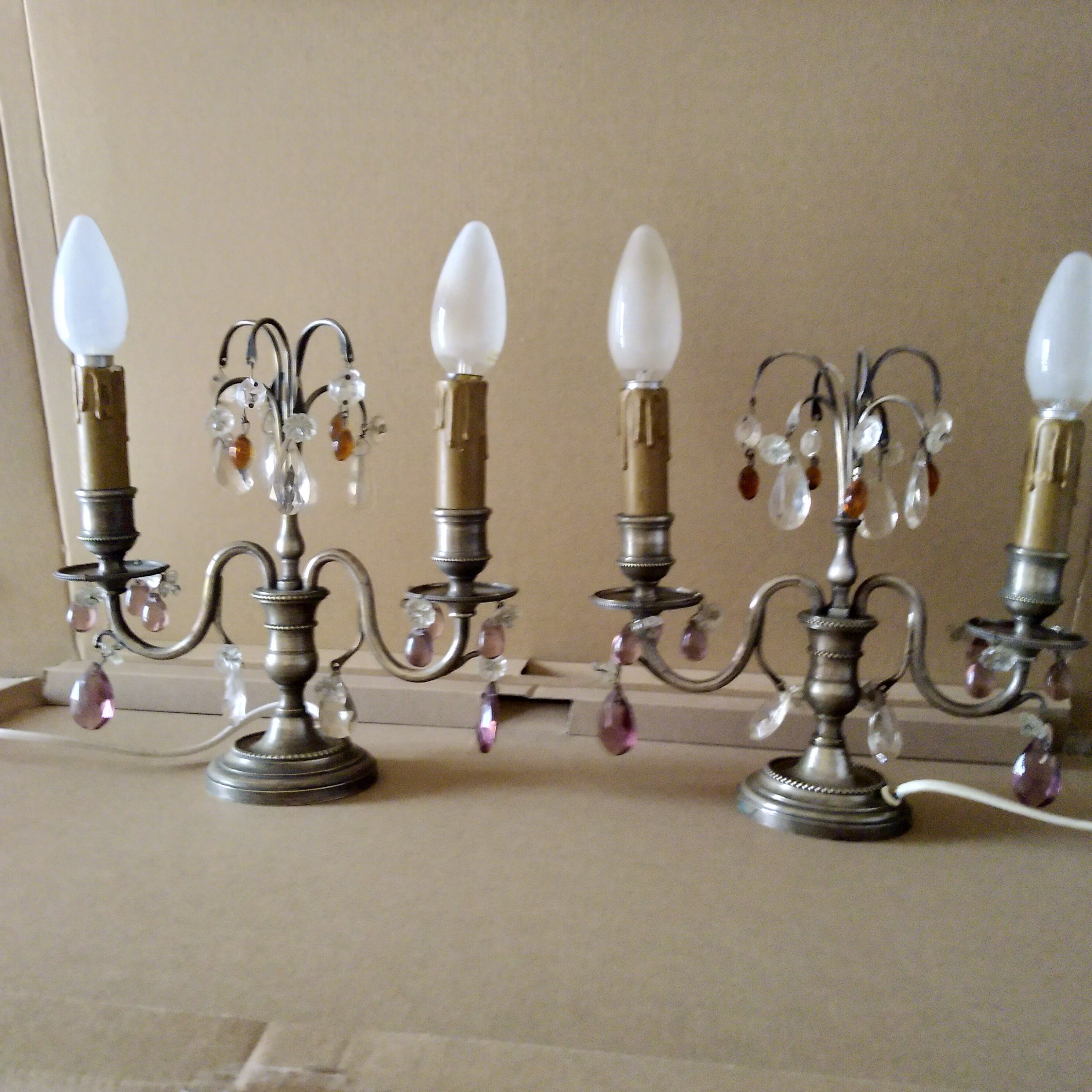 Pair of girandole lamps and silver metal