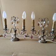 Pair of girandole lamps and silver metal