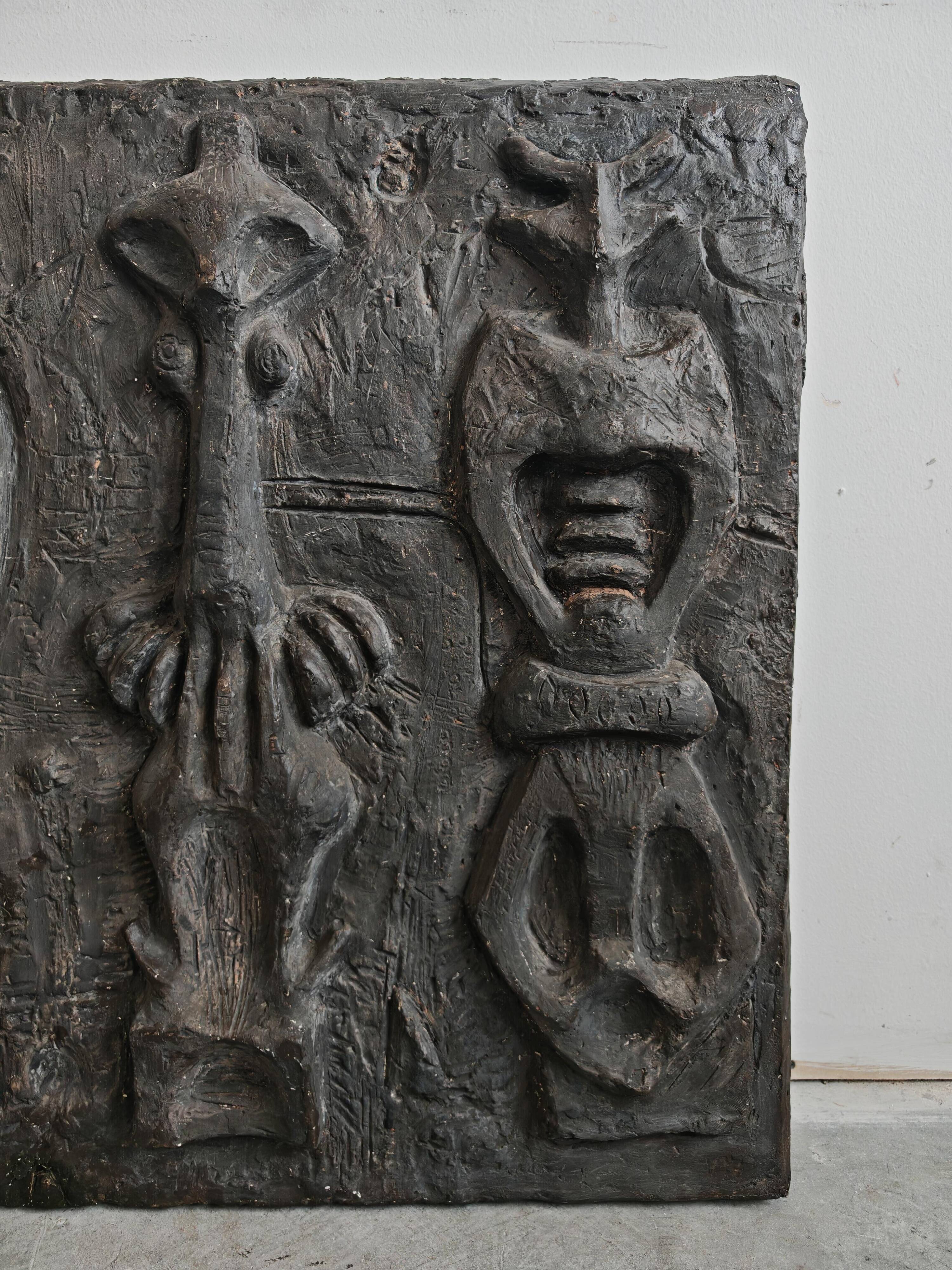 Sculptural anthropomorphic bas-relief by Venija Vučinić in plaster.
