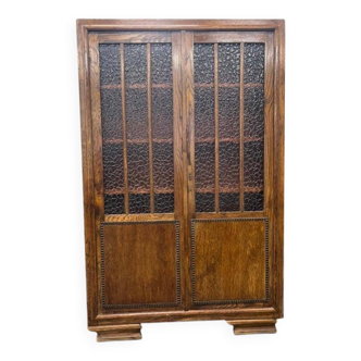 Vintage wooden display cabinet with textured glass.