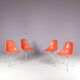 1960s dining chairs in orange fiberglass on chrome metal H-base / Charles & Ray Eames / Herman Miller, USA