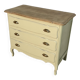 Old chest of drawers refurbished in beige cream