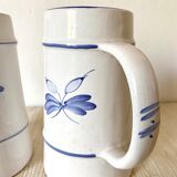 Chopes à bière fleuries en faïence