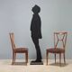 1950s chairs with wooden backs.