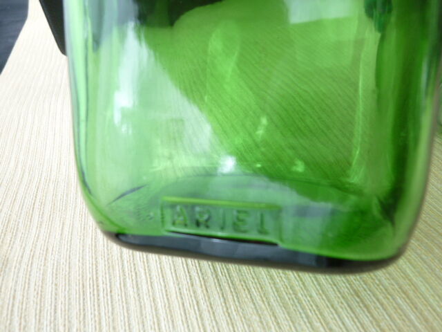 Set of 4 jars or bottles in colored glass Ariel 70s