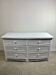 Curved chest of drawers in white woven rattan 1980's