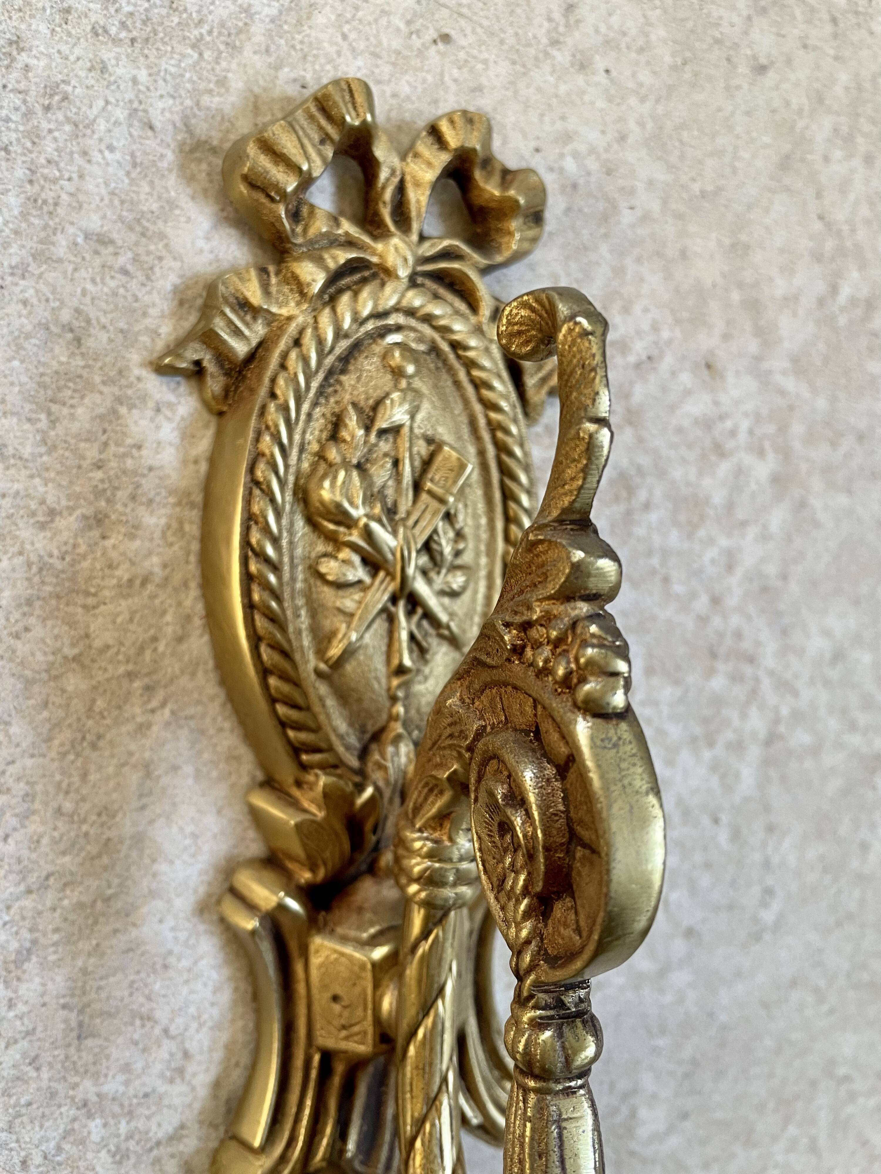 Pair of gilded bronze wall lamps Louis XVI style