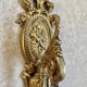 Paire d’appliques en bronze doré style Louis XVI