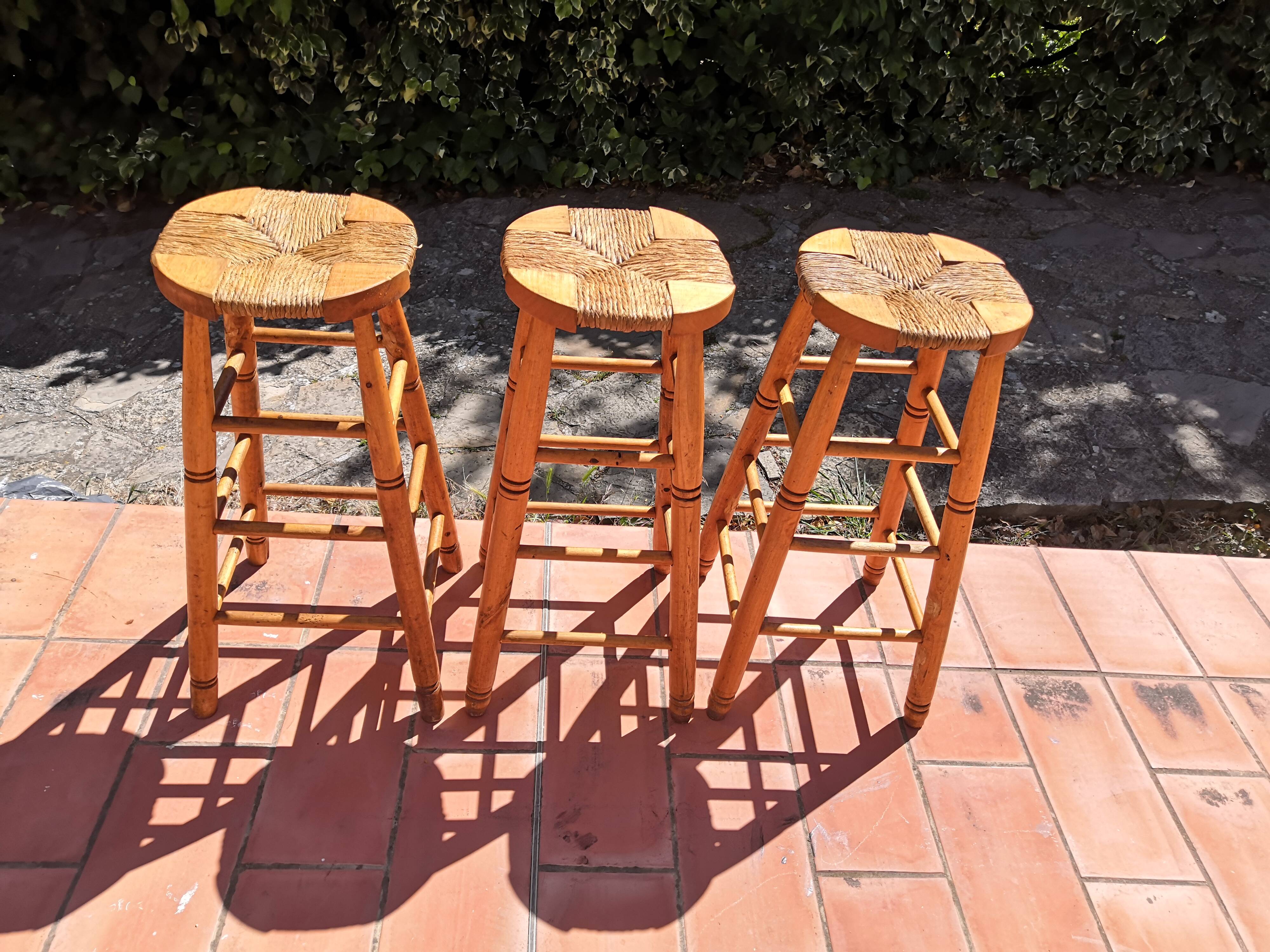 Set of 3 high “modernist” straw stools vintage 1950s