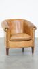 Comfortable, cozy, warm colored sheepskin club chair finished with decorative nails