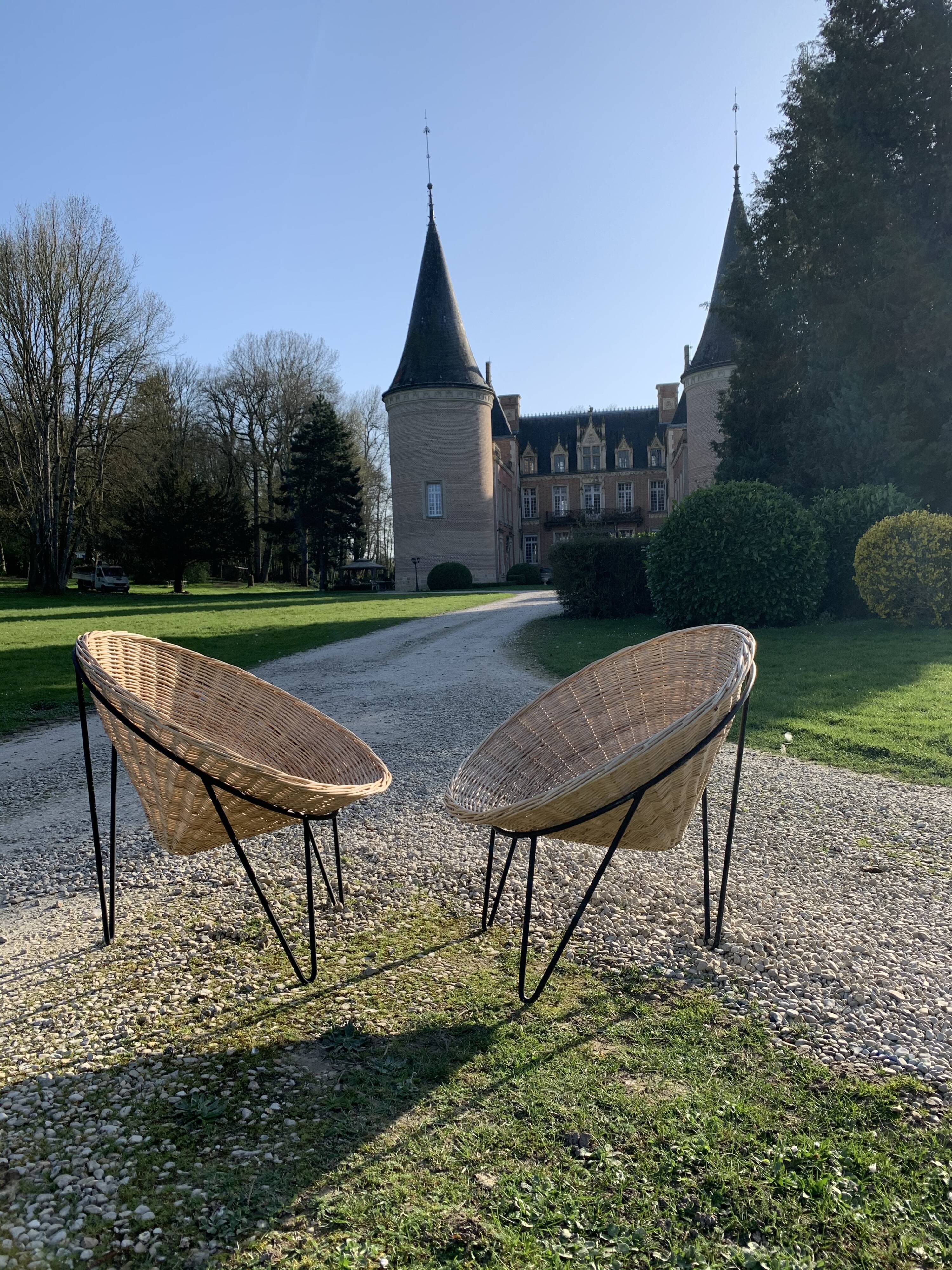 Pair of wicker "basket" armchairs
