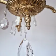 Antique chandelier with pendants, in bronze and glass pendants.