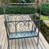 Art Deco magazine rack in wrought iron with bronze patina from around 1930-1940.