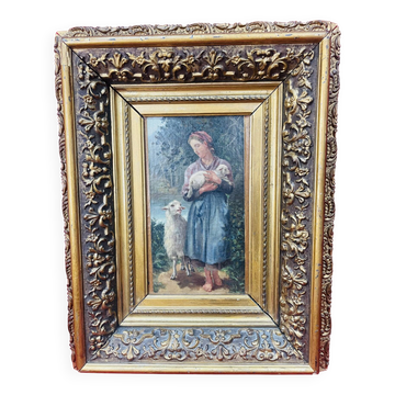 Oil painting on panel of a shepherdess with lambs after J.B. Hofner X