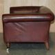 Vintage Art Deco leather sofa, three-seater, feather cushions.