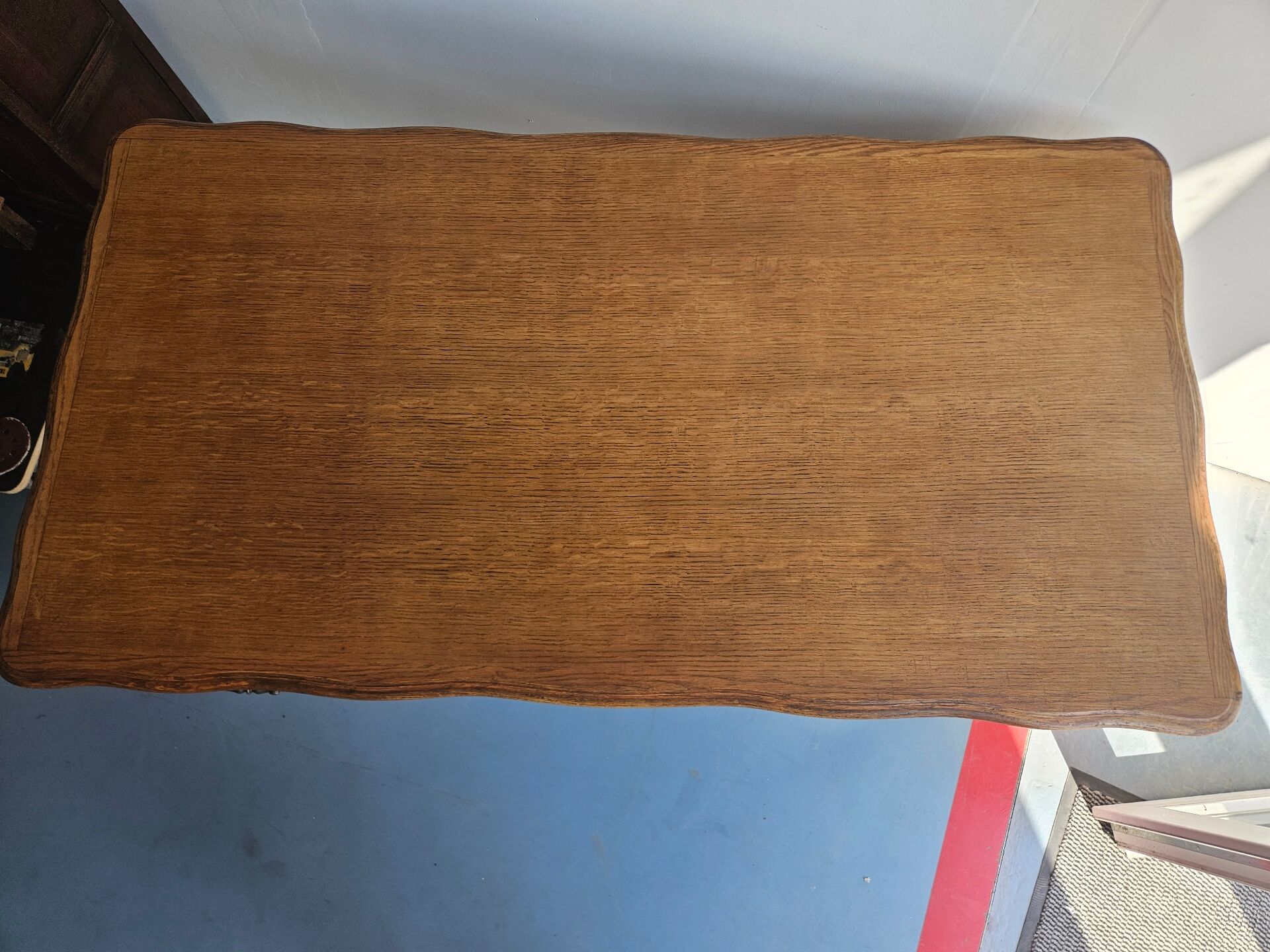 Antique wooden desk with 4 drawers.