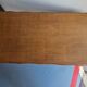 Antique wooden desk with 4 drawers.