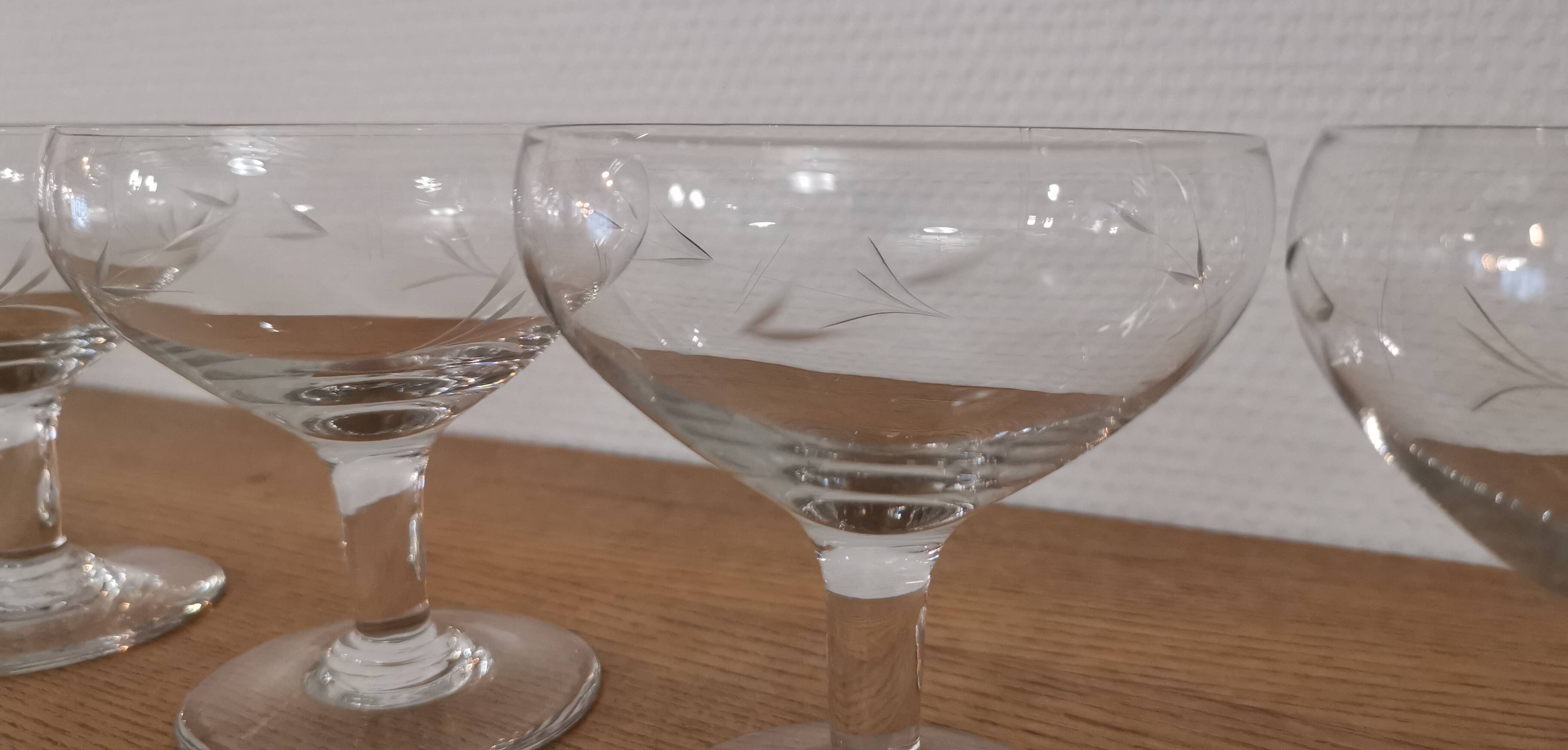 Set of 7 vintage engraved champagne glasses