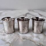 Set of 3 small silver 970 sterling cups with enamelled flags from the 20th century.