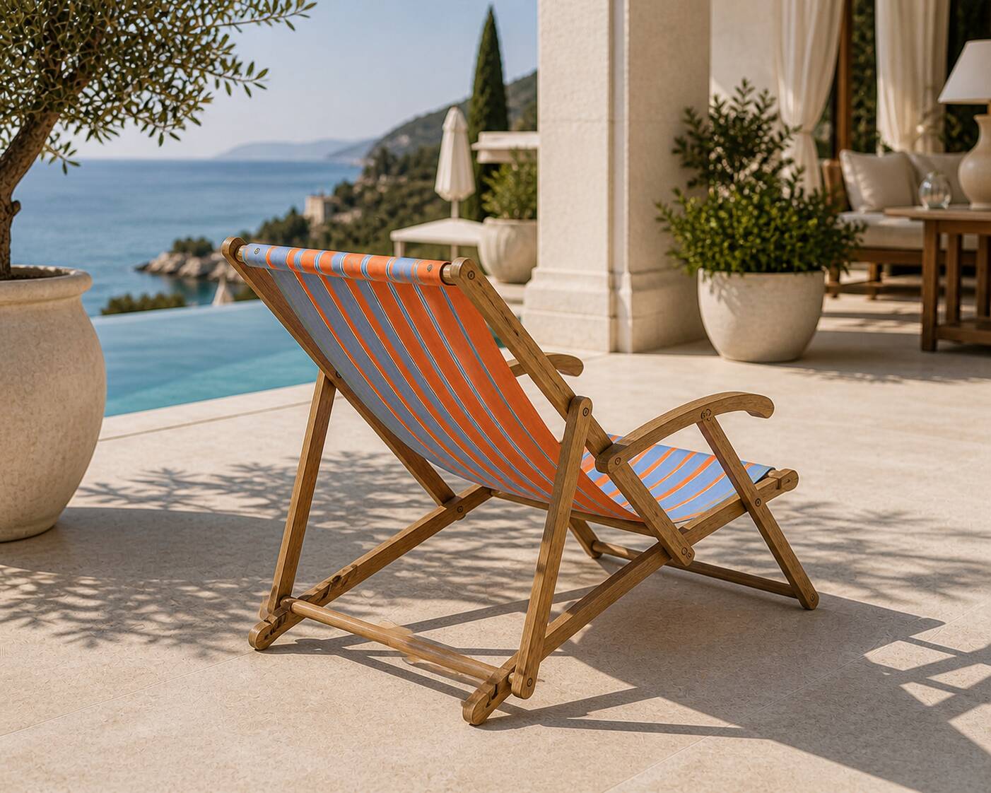 Vintage deck chair with orange and blue striped fabric, original patina.