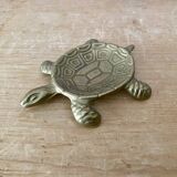 Vintage brass turtle pocket emptier