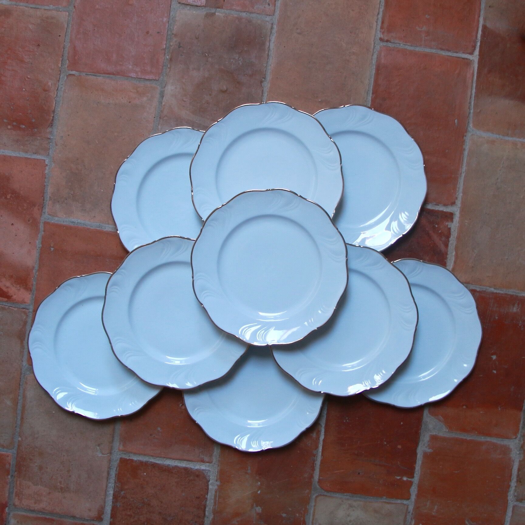 White and gold porcelain plates