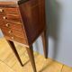 Louis XVI bedside table in mahogany with five drawers.