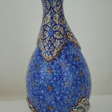 Piriform vase with a flared metal collar enamelled with a polychrome decoration, marked "Amini Iran" on the reverse.