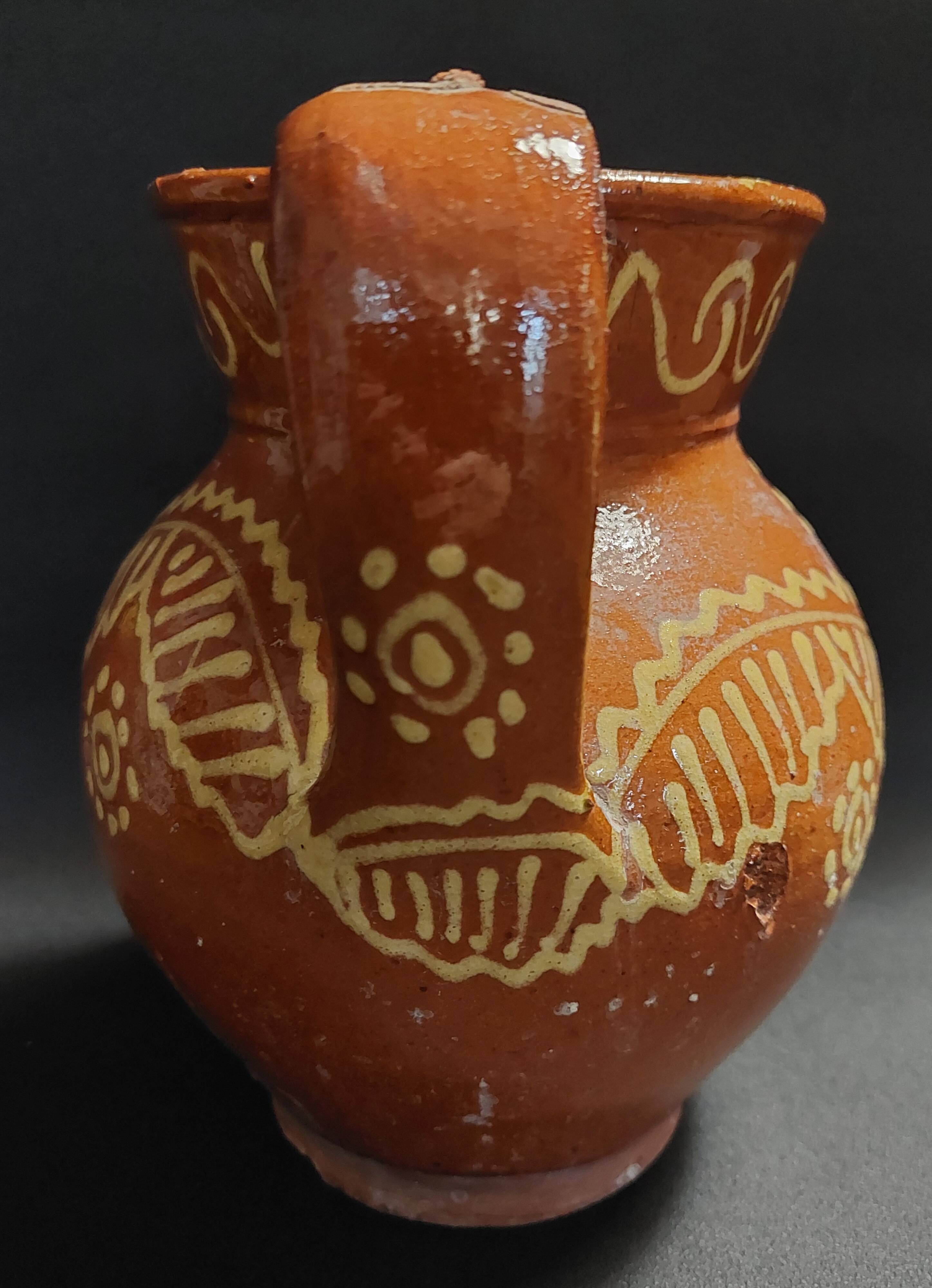 Varnished terracotta jug from Portugal, early 20th century.