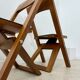 2 old folding chairs in wood and leather, postmodern design from the 80s vintage