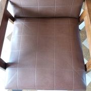 Scandinavian armchair in brown leatherette and wood