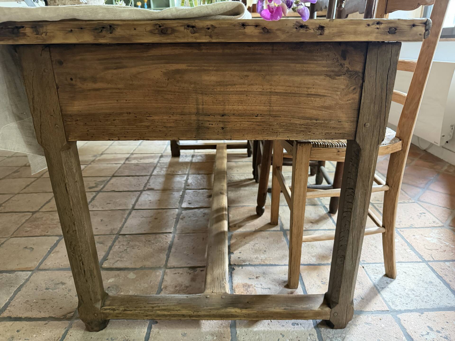 Renovated raw wood farmhouse table