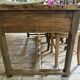 Renovated raw wood farmhouse table