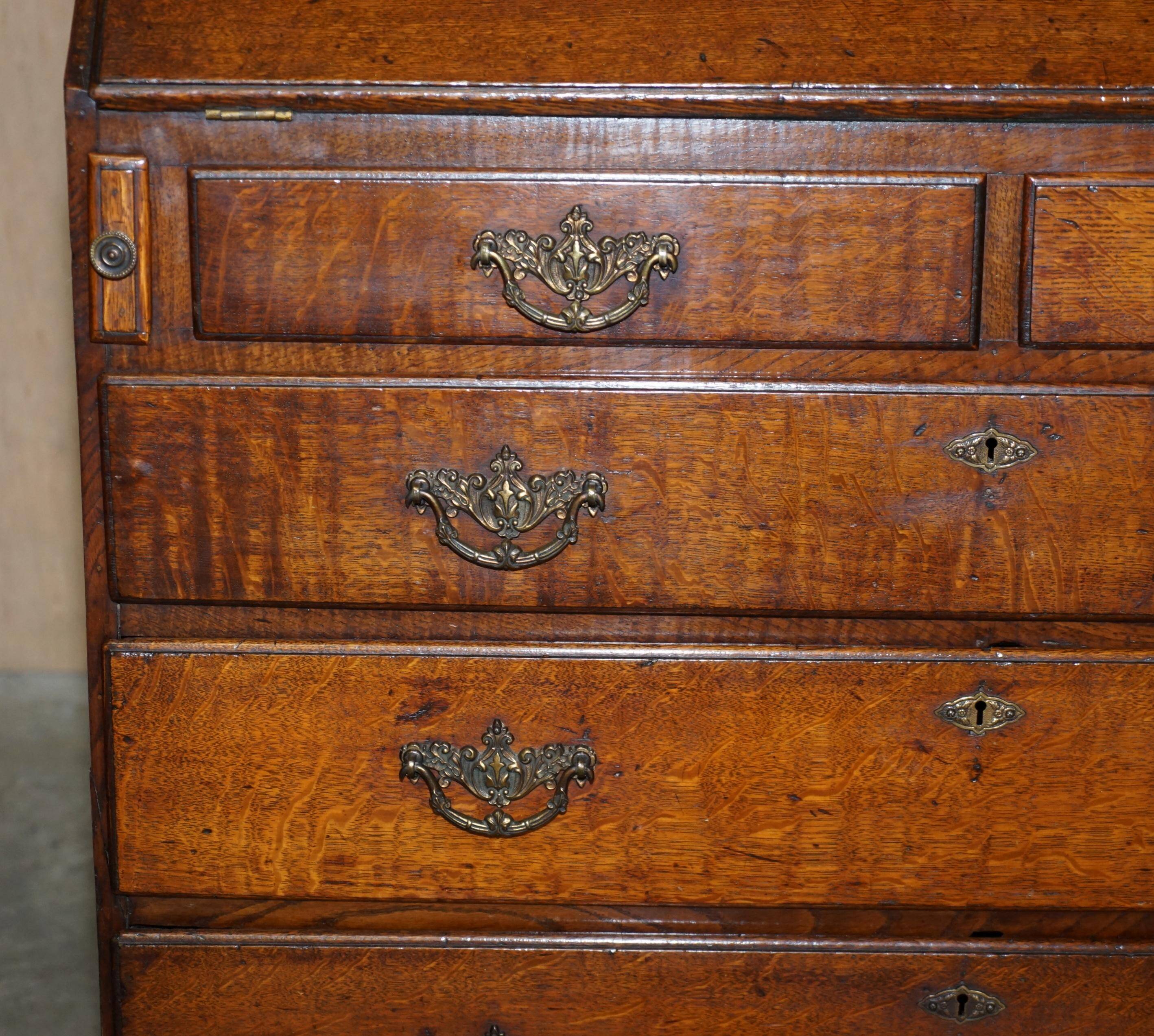 George III oak secretary bookcase circa 1760, Thomas Chippendale style.